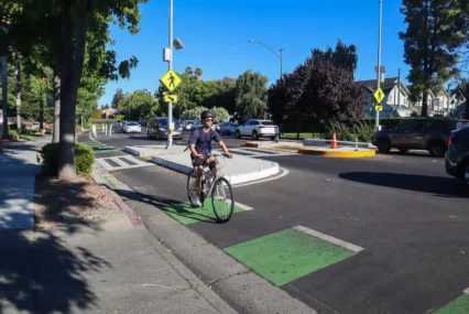 A man on a bicycle in a bike lane in Mountain View, California