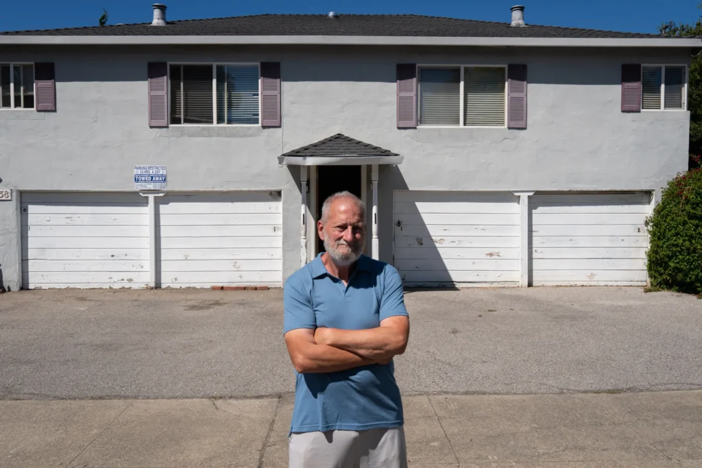A man standing outside an apartment building in Mountain View, California