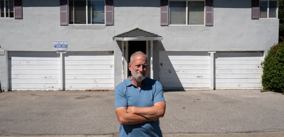 A man standing outside an apartment building in Mountain View, California