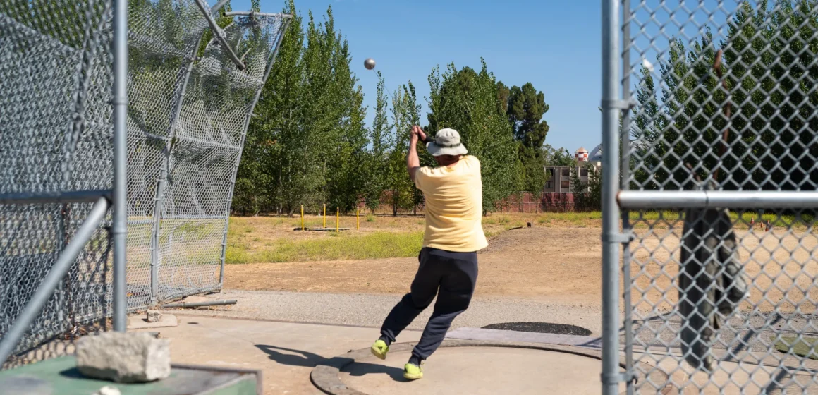 MV hammer throwing Embarcadero A person training at an athletic field in Mountain View, California