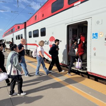 People boarding a train at a station in San Jose, California