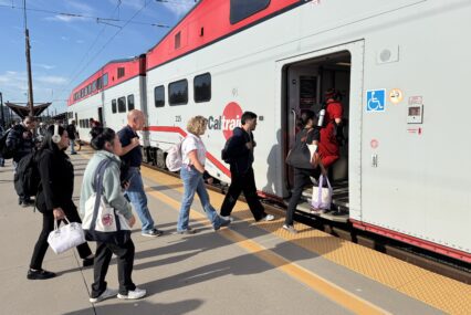 People boarding a train at a station in San Jose, California