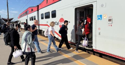 People boarding a train at a station in San Jose, California