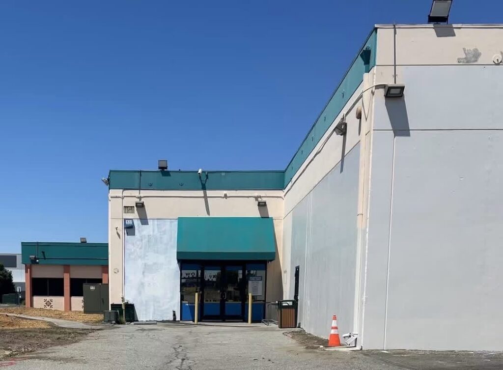 The exterior of a building with paint patches in San Jose, California