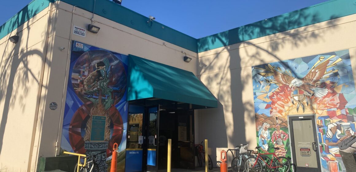 Two murals on the exterior of a building in San Jose, California
