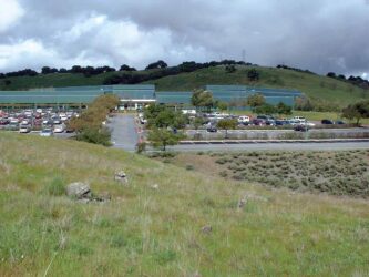 IBM REZONING A grass hil in front of a parking lot in San Jose, California