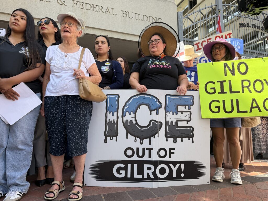 Demonstrators in front of the courthouse holding signs and placards in San Jose, California