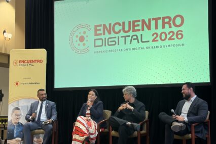 A row of people sitting in chairs at a conference in San Jose, California