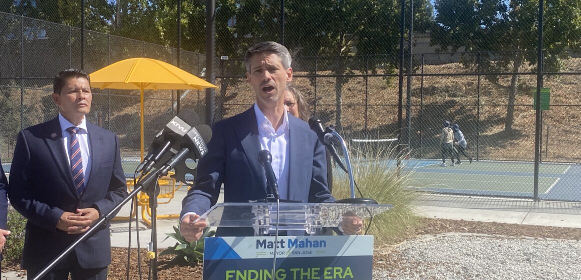 A man speaking at a podium outside in San Jose, California