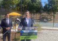 A man speaking at a podium outside in San Jose, California