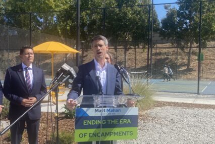 A man speaking at a podium outside in San Jose, California
