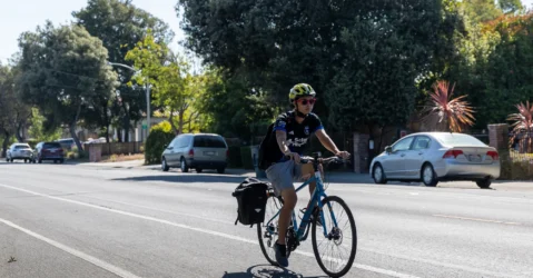 Person riding a bike on a road