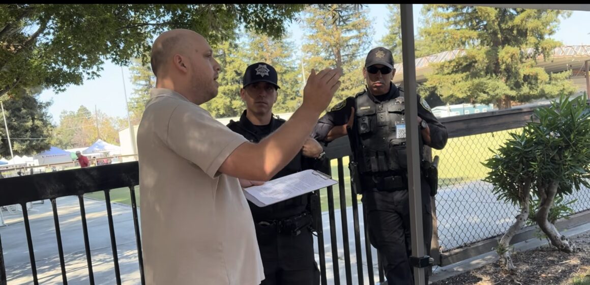 A man speaking with police outside in Santa Clara, California