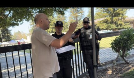 Art and Wine Fest Interaction 2026 A man speaking with police outside in Santa Clara, California