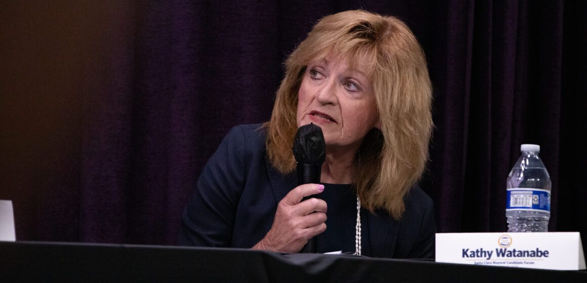 Santa Clara mayor election forum 2026 A woman holding a microphone at an election forum in Santa Clara, California