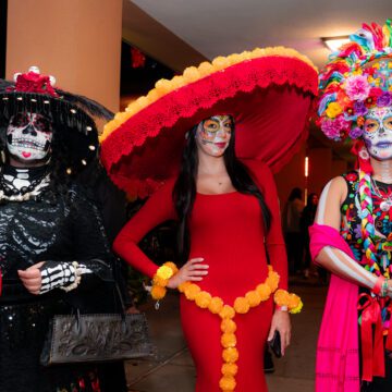 Avenida de Altares 2025 Three women in costume and makeup celebrating Dia de los Muertos in San Jose, California