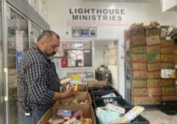 A man looking at produce at a food pantry in San Jose, California