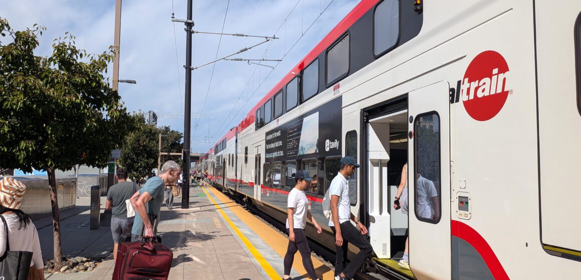 People boarding a train at a station in Sunnyvale, California