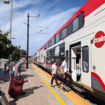 Caltrain at Sunnyvale station People boarding a train at a station in Sunnyvale, California