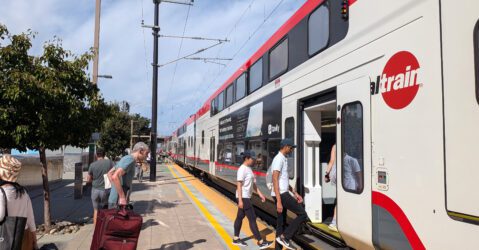 People boarding a train at a station in Sunnyvale, California