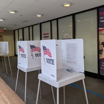 Early Voting Mail Ballots Voting booths inside an elections office in San Jose, California