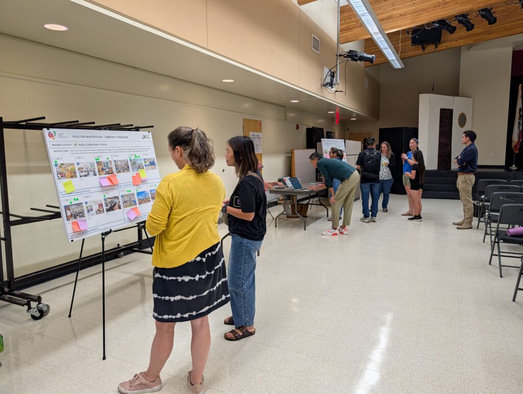 People looking at conceptual plans for a school renovation in San Jose, California