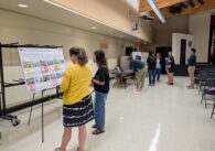 People looking at conceptual plans for a school renovation in San Jose, California