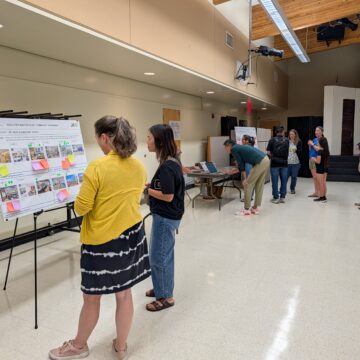 SJUSD CAMPUS RENOVATIONS People looking at conceptual plans for a school renovation in San Jose, California