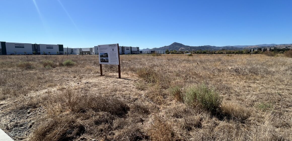 MH 105 HOMES A development sign on a piece of land in Morgan Hill, California