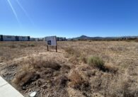 A development sign on a piece of land in Morgan Hill, California