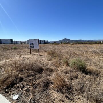 MH 105 HOMES A development sign on a piece of land in Morgan Hill, California
