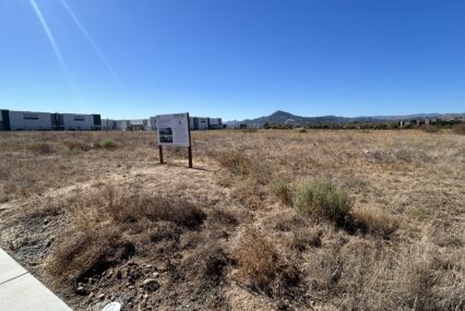 A development sign on a piece of land in Morgan Hill, California