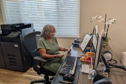 A woman sitting at a desk