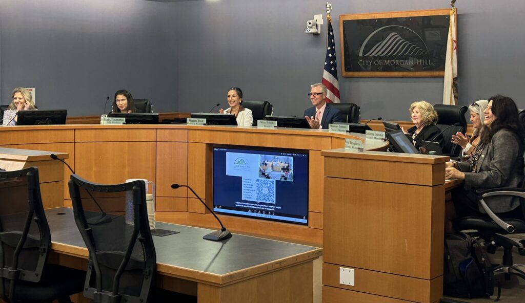 A group of people sitting at a government meeting in Morgan Hill, California